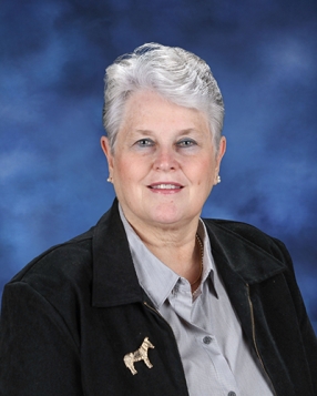Associate Director of Memorials & Archives Marilee Meyer