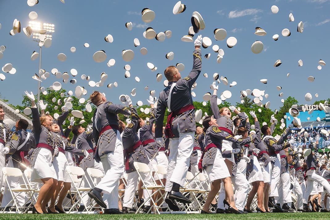 Cadet Graduation Tossing Hats in the Air