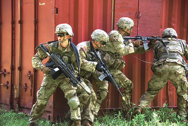A squad from 2nd Platoon, Alpha Company clears a building during a raid on CLDT Lane 5's MOUT site.