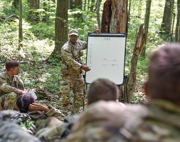 A platoon trainer performs a “hotwash” regarding a platoon’s performance on CLDT Lane 5.