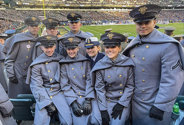 U.S. Coast Guard Academy Cadet Mackensi Rollings (center) at the 2022 Army-Navy Game with her companymates from F-3.
