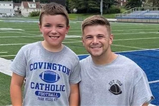 Trey Gronotte ’25 with 10-year-old Gregor Popham